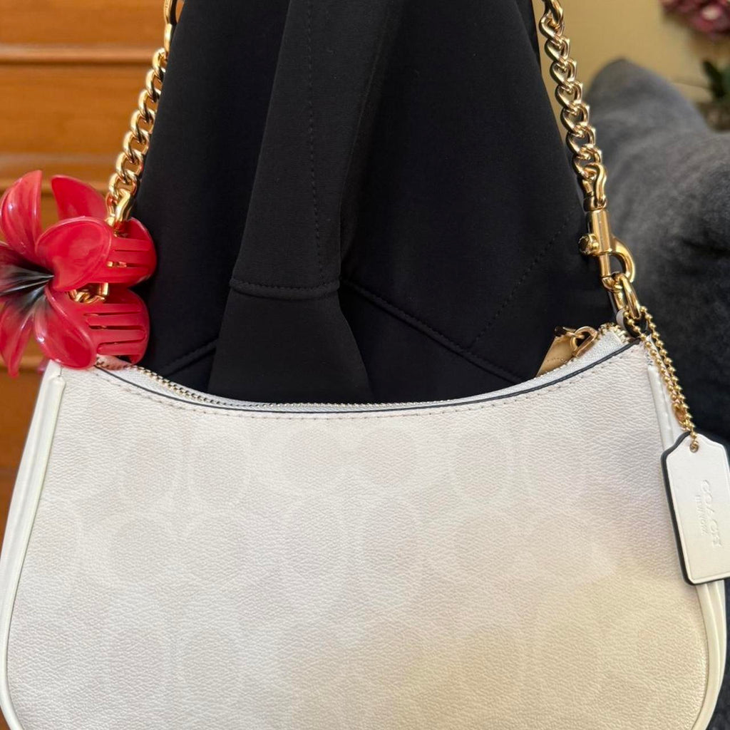 Teri white coach shoulder bag with gold hardware