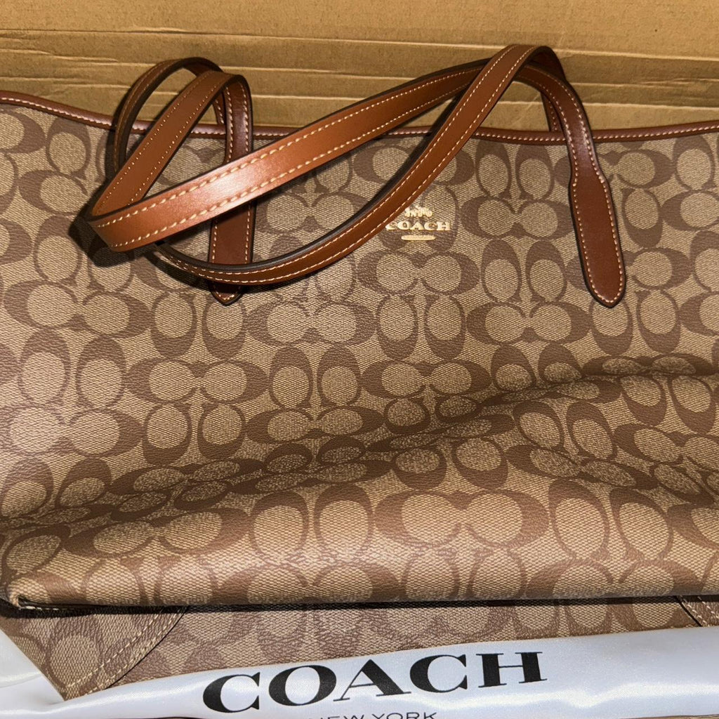 Tan and brown Coach tote bag