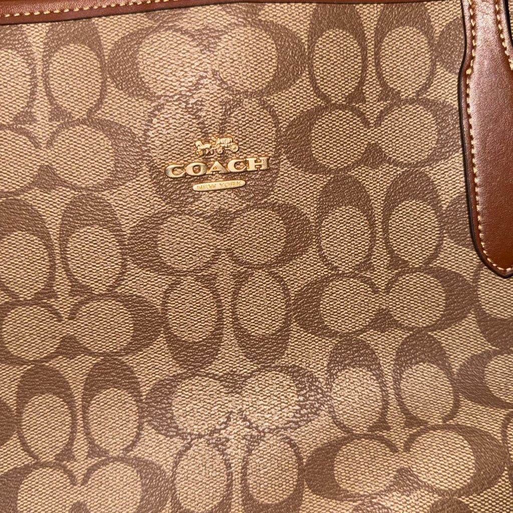 Tan and brown Coach tote bag