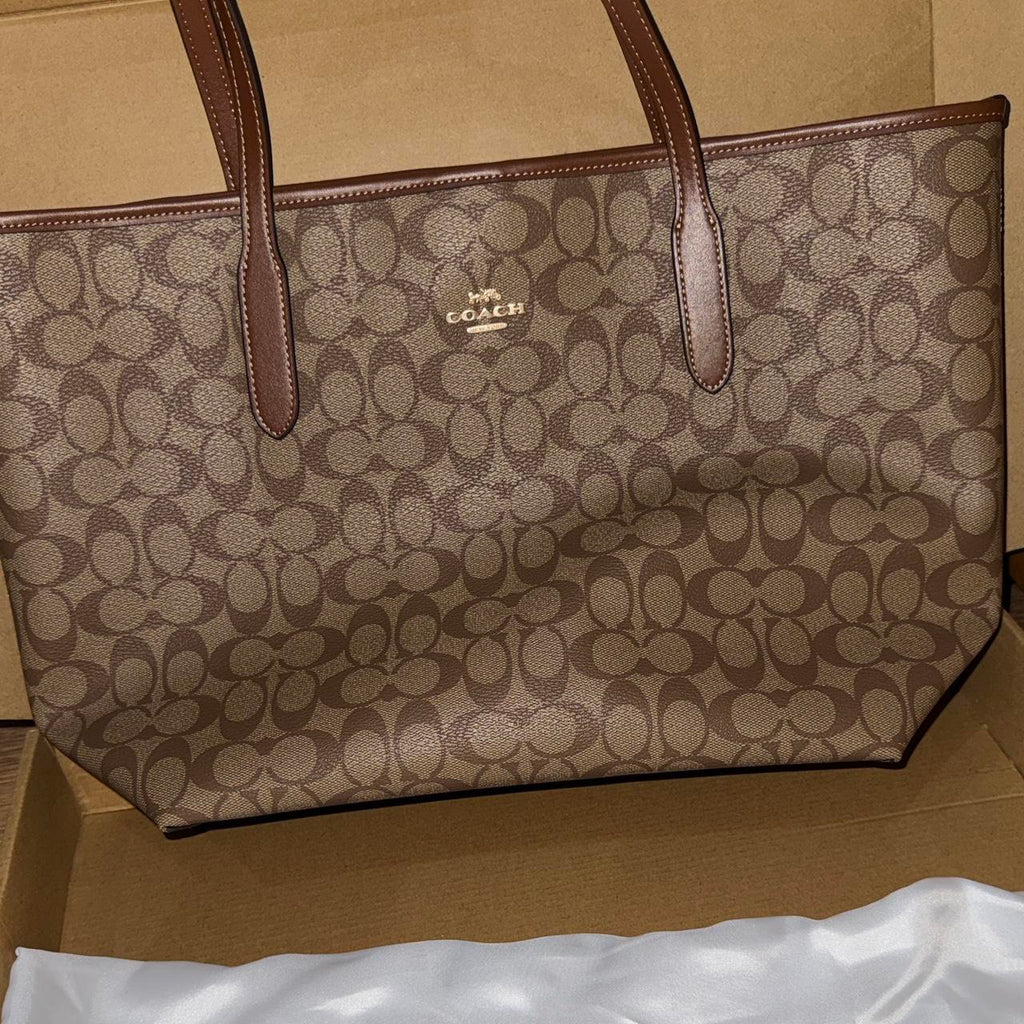 Tan and brown Coach tote bag