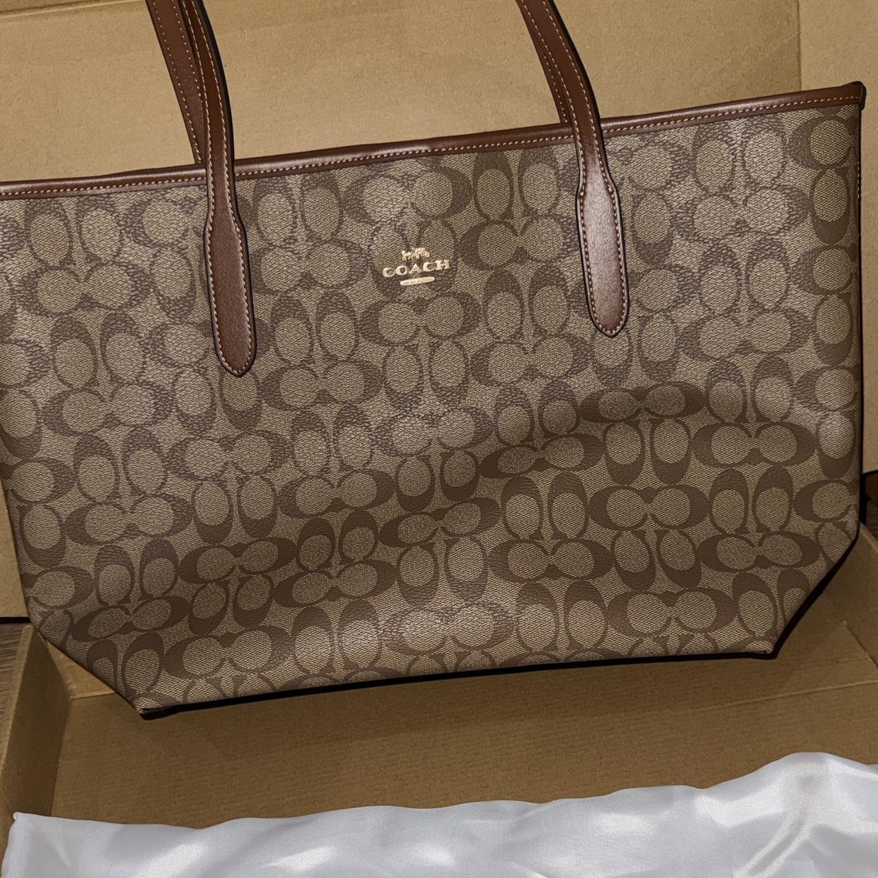 Tan and brown Coach tote bag