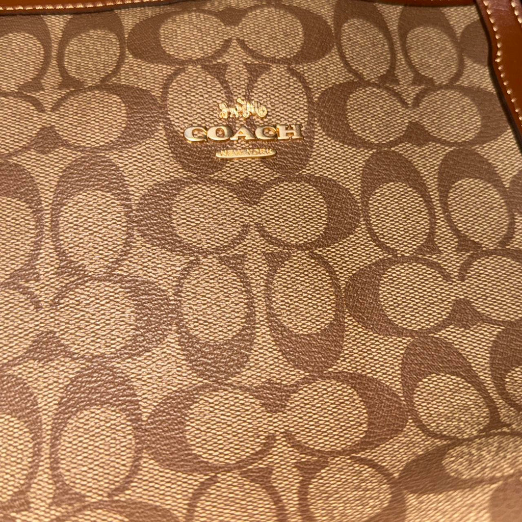 Tan and brown Coach tote bag