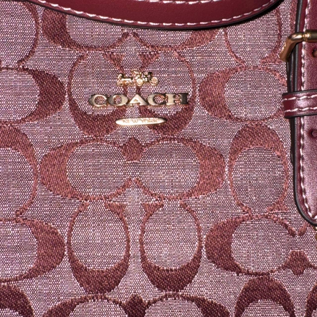 Burgundy Coach Signature canvas shoulder bag