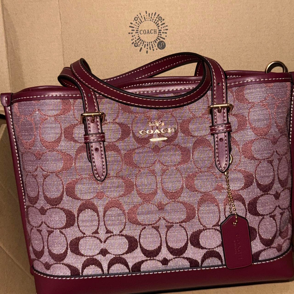 Burgundy Coach Signature canvas shoulder bag
