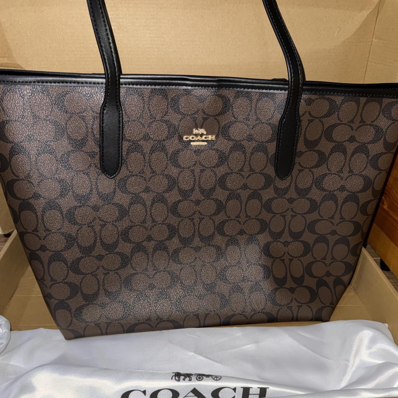 Brown and black Coach leather tote bag