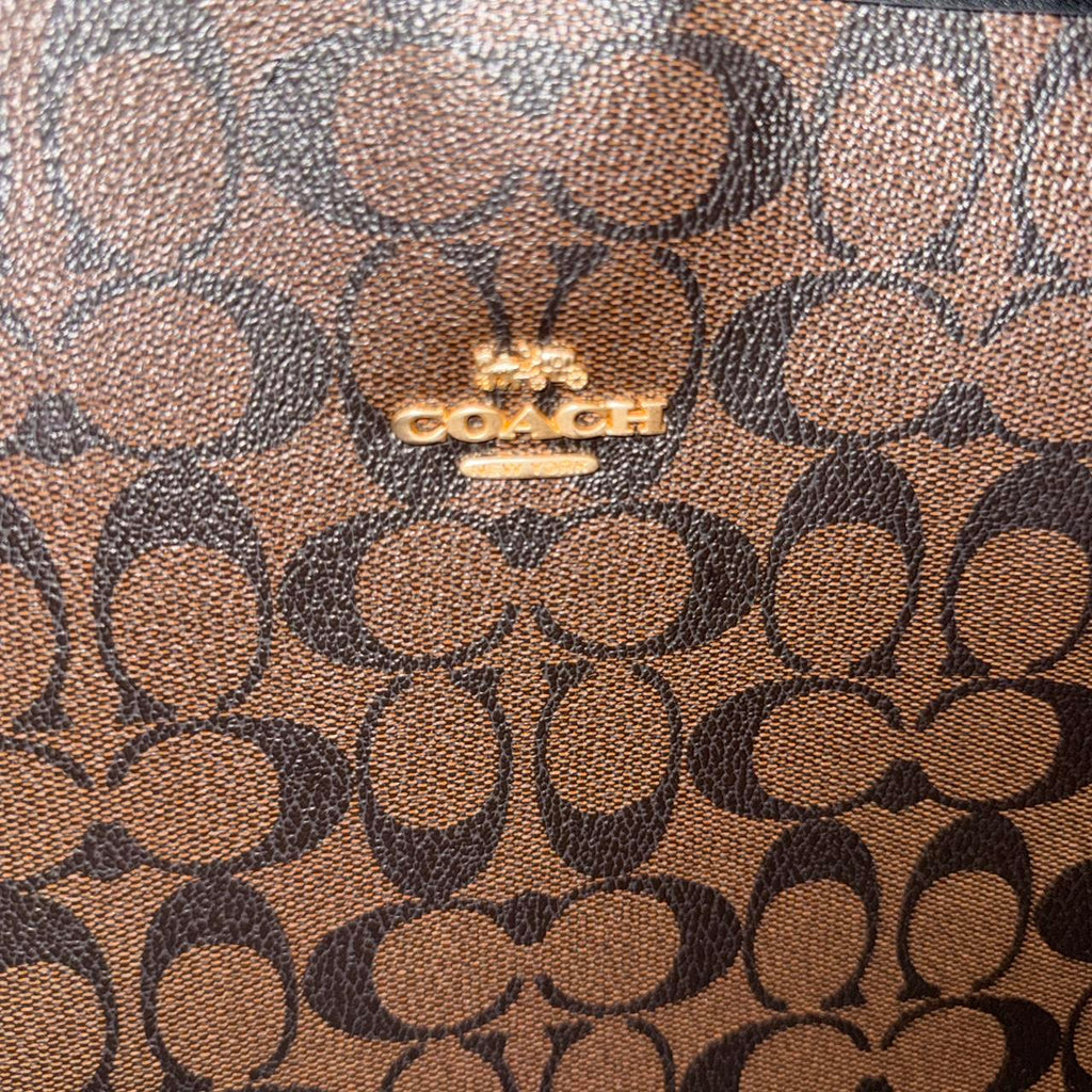 Brown and black Coach leather tote bag