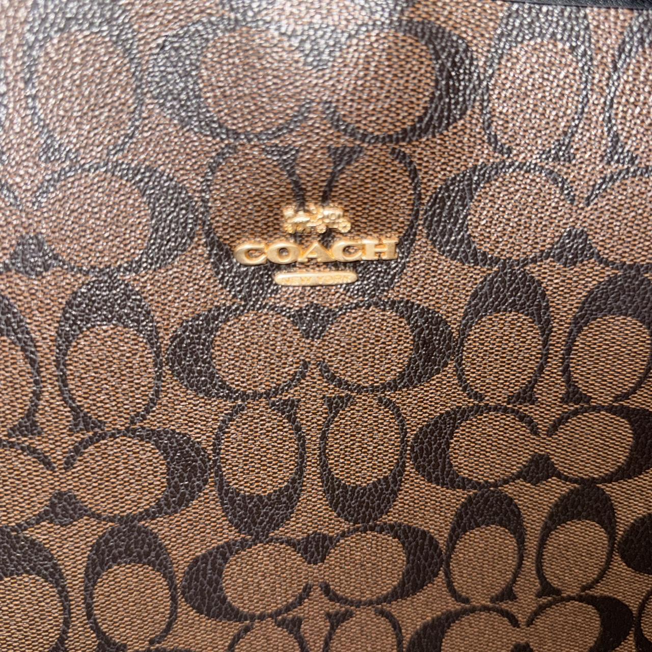 Brown and black Coach leather tote bag