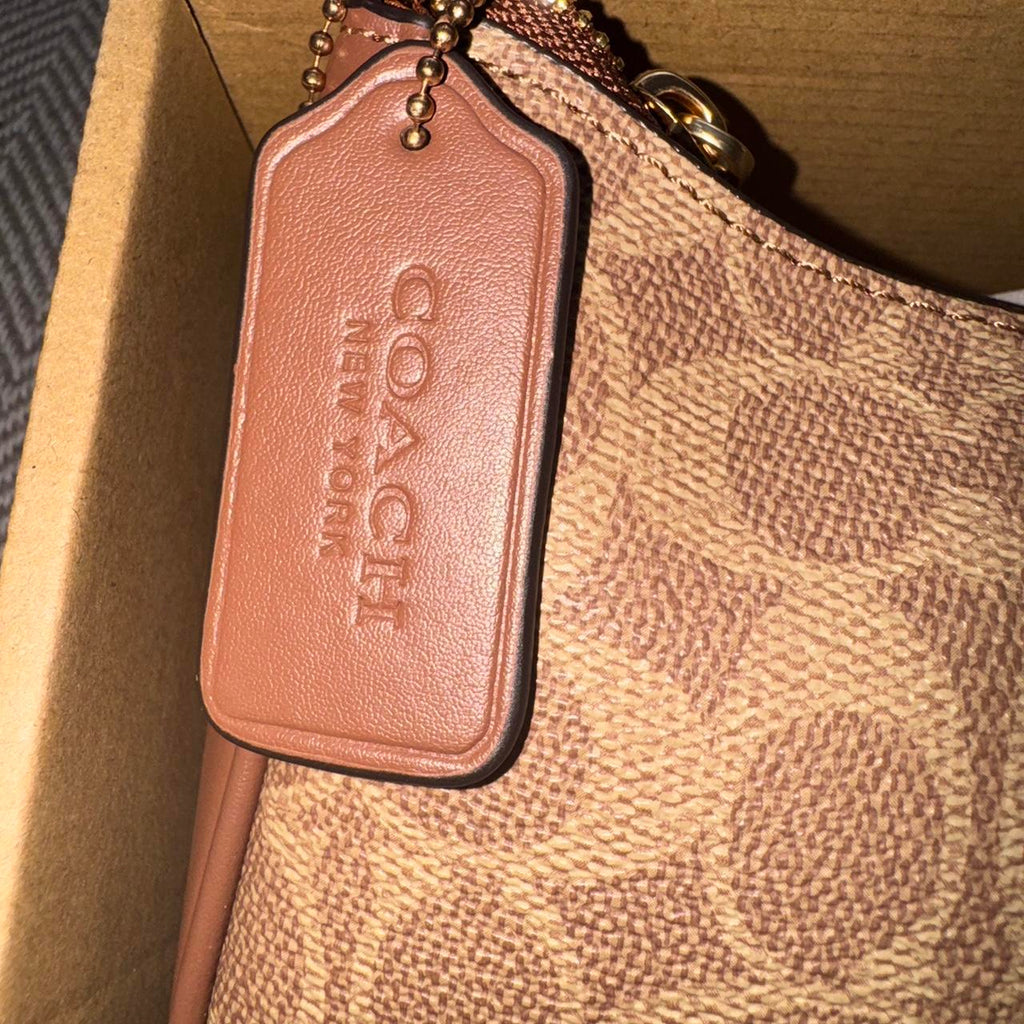 Coach Signature Canvas Soho Shoulder Bag in brown and tan