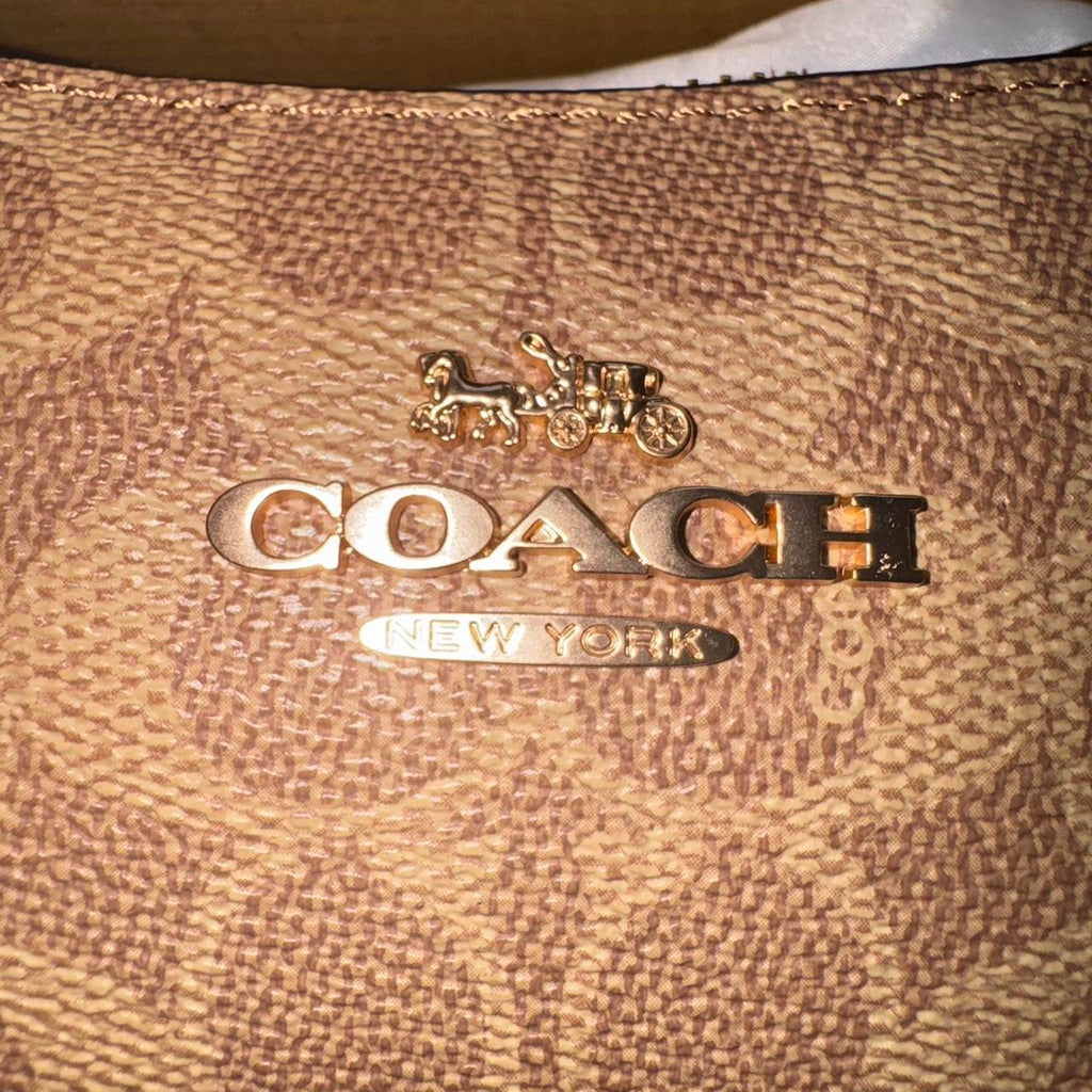 Coach Signature Canvas Soho Shoulder Bag in brown and tan