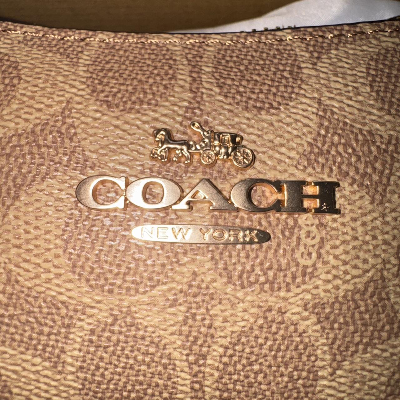 Coach Signature Canvas Soho Shoulder Bag in brown and tan