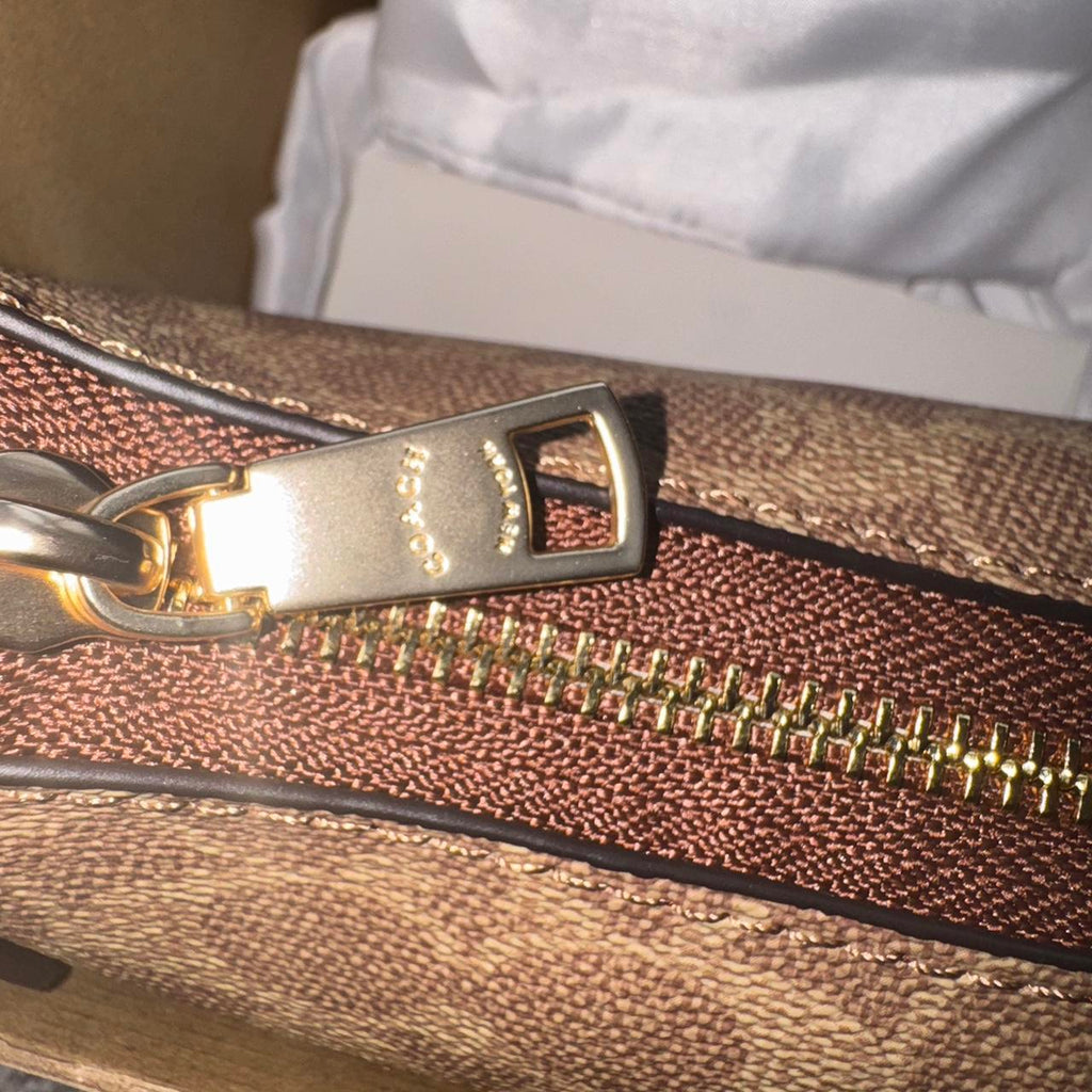 Coach Signature Canvas Soho Shoulder Bag in brown and tan