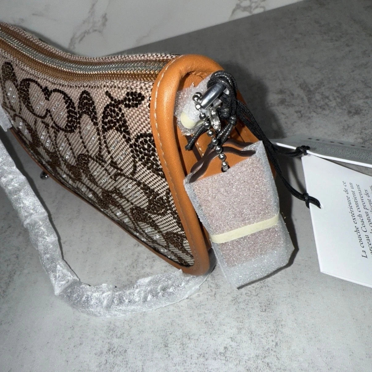 Coach crystal swinger bag